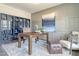 This stylish home office features custom bookcases, panelled walls, and a spacious desk for a productive workspace at 15 Atherton Circle, Angier, NC 27501