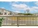 A cozy balcony overlooking a peaceful neighborhood showcases outdoor living and community charm at 1613 Clayfire Dr, Cary, NC 27519