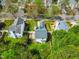 Overhead shot of a home showing its backyard, landscaping, and proximity to other residences at 200 Adefield Ln, Holly Springs, NC 27540