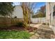 Cozy backyard with a stone pathway and a privacy fence at 200 Adefield Ln, Holly Springs, NC 27540