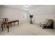 Bonus room featuring a desk, exercise bike, and sitting chair at 2032 Stoneglen Ln, Raleigh, NC 27603