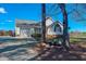 Charming single-Gathering home with a two-car garage, manicured lawn and landscaping on a sunny day at 2105 Antioch Church Rd, Timberlake, NC 27583
