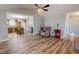 Spacious living room with hardwood floors, ample seating, and natural light at 2105 Antioch Church Rd, Timberlake, NC 27583