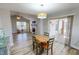 Open concept living space leading to kitchen and patio at 2105 Antioch Church Rd, Timberlake, NC 27583