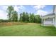 Large backyard with newly installed sod, ready for outdoor activities at 213 Umstead St, Sanford, NC 27330