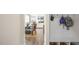 Mudroom with storage and hooks leads to open living space at 213 Umstead St, Sanford, NC 27330