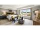 Spacious primary bedroom featuring natural light and tray ceiling at 213 Umstead St, Sanford, NC 27330