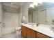 Bathroom with shower-tub combination, vanity, and toilet at 217 Waterford Lake Dr, Cary, NC 27519