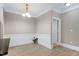 Dining area featuring modern lighting, white trim, and neutral paint at 217 Waterford Lake Dr, Cary, NC 27519