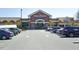 Exterior of the neighborhood grocery store with ample parking at 217 Waterford Lake Dr, Cary, NC 27519