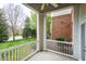 Relaxing screened-in porch with view of the lawn at 217 Waterford Lake Dr, Cary, NC 27519