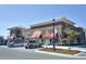 Conveniently located shopping center with brick facade and awning-covered storefronts at 217 Waterford Lake Dr, Cary, NC 27519