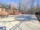 Backyard with patio, fenced pool with cover, and large wooded lot at 2440 Helena Moriah Rd, Timberlake, NC 27583