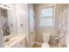 Bright and airy bathroom with a window, shower curtain, and tiled floors at 2440 Helena Moriah Rd, Timberlake, NC 27583