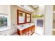 Bathroom featuring a double vanity with framed mirrors and plenty of natural light at 2440 Helena Moriah Rd, Timberlake, NC 27583