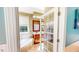 Relaxing bathroom featuring a soaking tub, tiled floors, and French door at 2440 Helena Moriah Rd, Timberlake, NC 27583