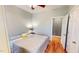 Cozy bedroom with hardwood floors and a light color scheme at 2440 Helena Moriah Rd, Timberlake, NC 27583