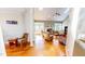 Open living room with hardwood floors, fireplace, neutral decor, and lots of space at 2440 Helena Moriah Rd, Timberlake, NC 27583