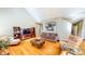 Spacious living room with hardwood floors, neutral colors, and ample natural light at 2440 Helena Moriah Rd, Timberlake, NC 27583