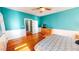 Bedroom with hardwood floors, plenty of closet space, and comfortable bed at 2440 Helena Moriah Rd, Timberlake, NC 27583