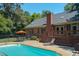 Pool with sunbathing lounge chair and deck off of home at 2440 Helena Moriah Rd, Timberlake, NC 27583