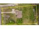 Overhead aerial view of the property, with an outlined boundary to highlight the lot at 2563 Millbrook Dr, Haw River, NC 27258
