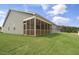 Spacious screened-in back porch overlooking the lush green lawn at 280 Providence Creek Dr, Fuquay Varina, NC 27526