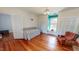 Bedroom with hardwood floors, daybed and two closets at 308 College St, Oxford, NC 27565