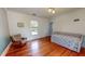 Bedroom featuring wood floors, and a daybed at 308 College St, Oxford, NC 27565