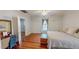 Bedroom featuring wood floors, a window seat, and neutral tones at 308 College St, Oxford, NC 27565