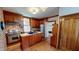 Well-appointed kitchen with stainless steel appliances and wood cabinetry at 308 College St, Oxford, NC 27565