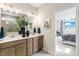 Chic bathroom with double vanity, granite countertops, and decorative accents at 312 Providence Creek Dr, Fuquay Varina, NC 27526