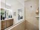 Stylish bathroom with modern fixtures, sleek countertops, and a glass-enclosed shower for a luxurious feel at 312 Providence Creek Dr, Fuquay Varina, NC 27526