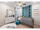 Charming bedroom with playful decor, perfect for a room or guest space at 312 Providence Creek Dr, Fuquay Varina, NC 27526