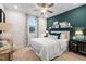 Inviting bedroom with a comfortable bed, stylish decor, and natural light at 312 Providence Creek Dr, Fuquay Varina, NC 27526