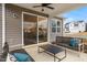 Relaxing covered patio with comfortable seating, ideal for outdoor gatherings and leisure at 312 Providence Creek Dr, Fuquay Varina, NC 27526