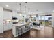 Spacious kitchen with kitchen island, stainless appliances, and open layout to dining area at 312 Providence Creek Dr, Fuquay Varina, NC 27526