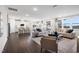Spacious living area seamlessly connecting to a modern kitchen, perfect for entertaining and Gathering gatherings at 312 Providence Creek Dr, Fuquay Varina, NC 27526
