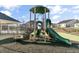 Community playground featuring slide and climbing structure for recreation at 312 Providence Creek Dr, Fuquay Varina, NC 27526