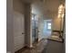En Suite bath with double granite vanity, tiled floors, glass shower, and private toilet at 34 E American Marigold Dr # 64, Benson, NC 27504