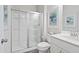 Clean bathroom with a glass shower and vanity offering plenty of counter space at 34 E American Marigold Dr # 64, Benson, NC 27504