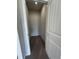 Walk-in closet featuring neutral carpet, white trim and paint, and interior lighting at 34 E American Marigold Dr # 64, Benson, NC 27504