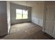 Formal dining room with wainscoting, a chandelier, and a large window at 34 E American Marigold Dr # 64, Benson, NC 27504