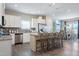 Beautiful kitchen with a center island, stainless steel appliances and adjacent dining area at 34 E American Marigold Dr # 64, Benson, NC 27504