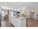 Spacious living area features a large kitchen island, open to the living and dining spaces at 34 E American Marigold Dr # 64, Benson, NC 27504