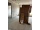 Unfinished room with drywall, concrete flooring, and boxed materials ready for build-out at 34 E American Marigold Dr # 64, Benson, NC 27504
