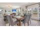 Elegant dining area adjacent to the living room features a rustic table and stylish decor at 39 Atherton Circle, Angier, NC 27501