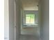 Bright hallway featuring sliding glass doors leading to the outdoor space at 39 Atherton Circle, Angier, NC 27501