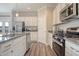 Well-equipped kitchen features stainless steel appliances, granite countertops, and ample cabinet space at 39 Atherton Circle, Angier, NC 27501