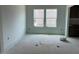 Spacious living room with lots of natural light from the double windows at 39 Atherton Circle, Angier, NC 27501
